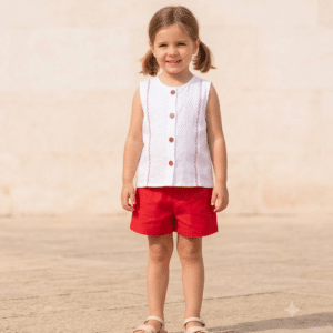 alt="Niña con blusa Laura de Kannela"
